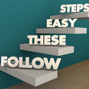 Staircase that is heading upstairs with words stating follow these easy steps.