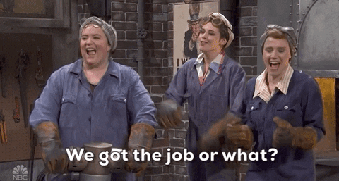 GIF of three women in boilersuits asking: We got the job or what?