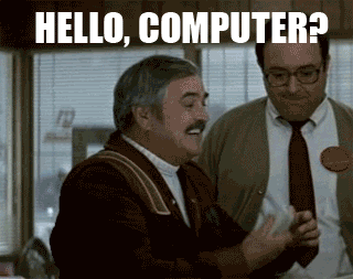 Man says "Hello, Computer?" into mouse.